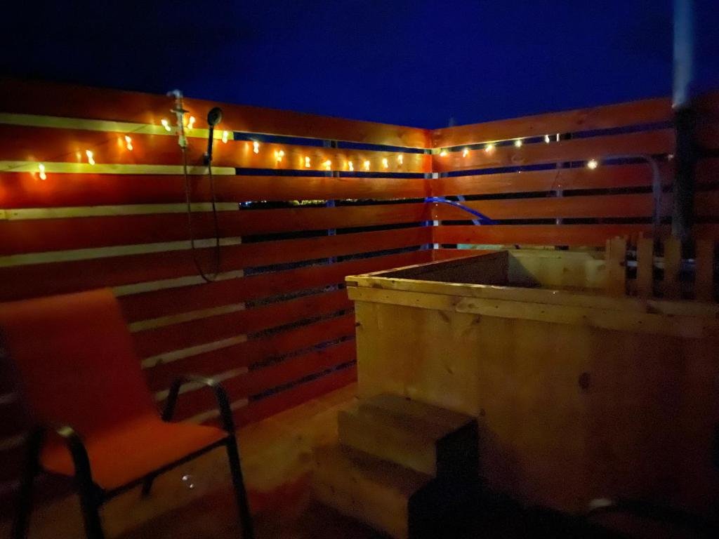 Cabaña y tinaja